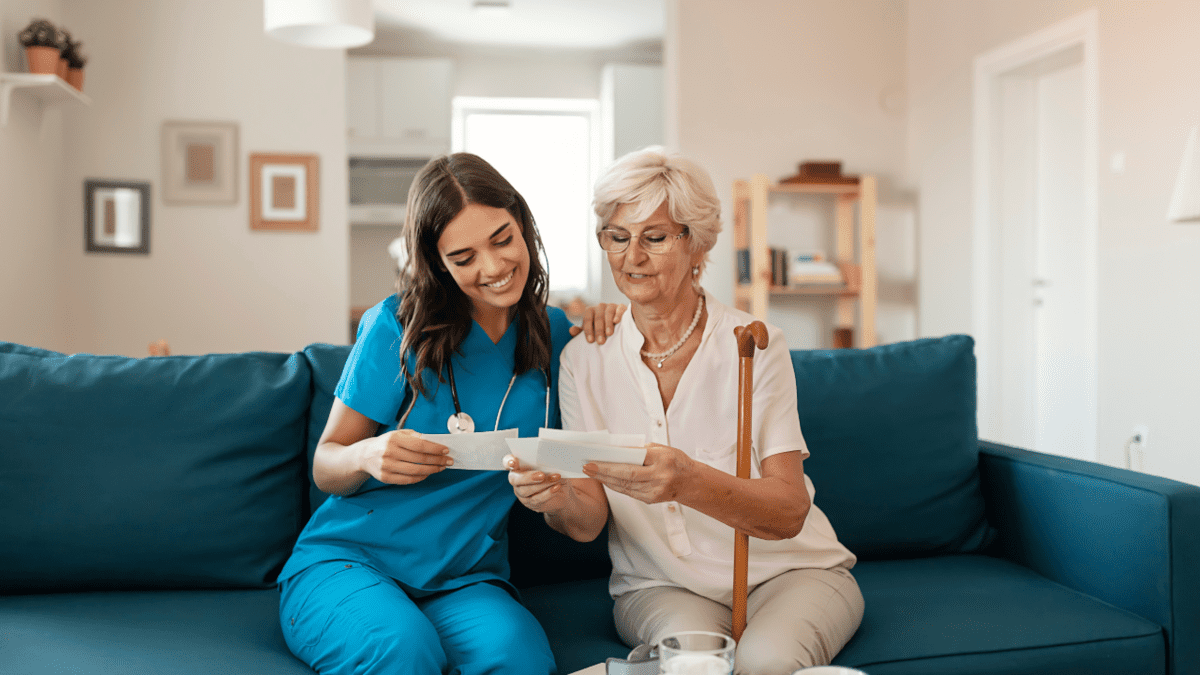 Skilled Nursing vs Memory Care - photo shows nursing staff helping senior lady